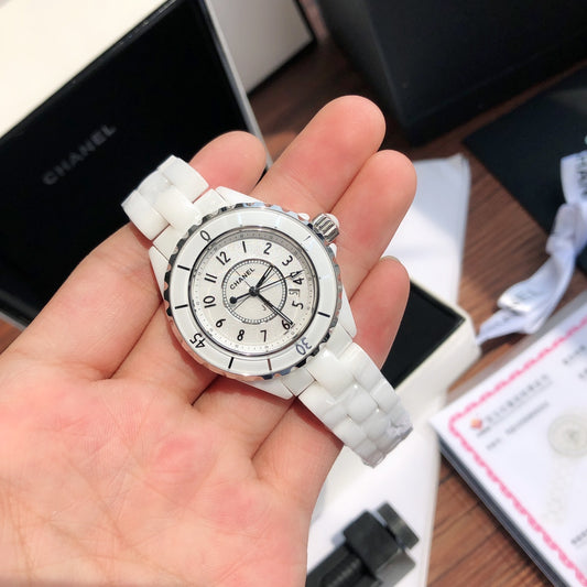** CHANEL J12 Luxury Watch with Real Diamonds & Swiss Movement
**